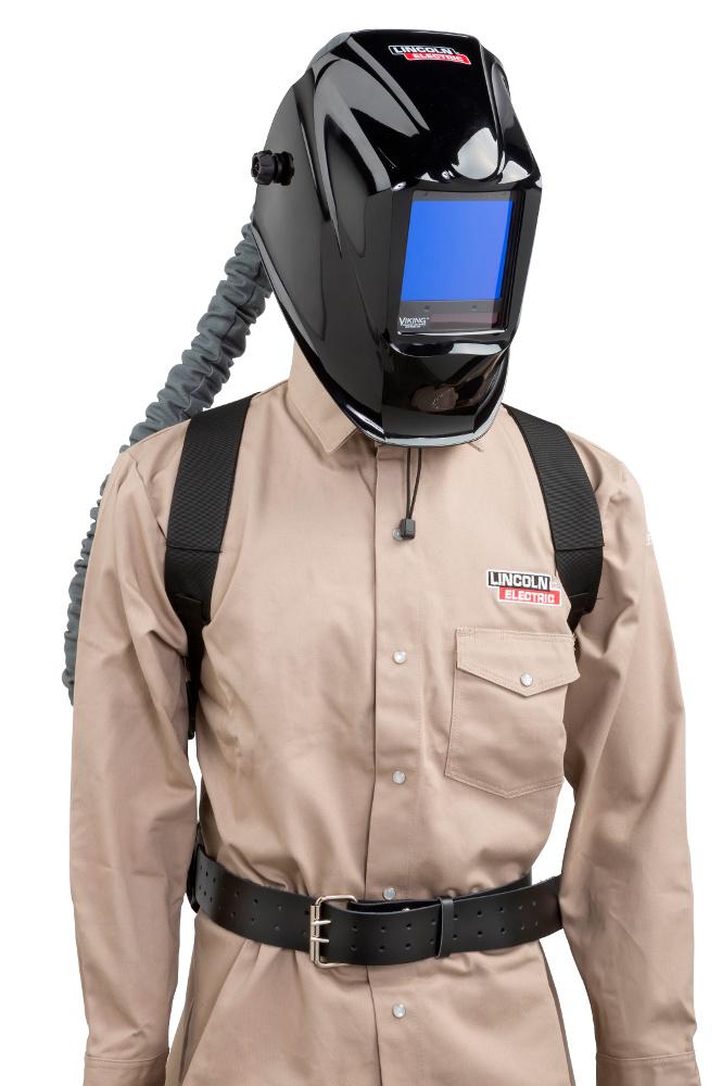 Welding helmet delivers filtered air into breathing zone Welding helmet delivers filtered air into breathing zone